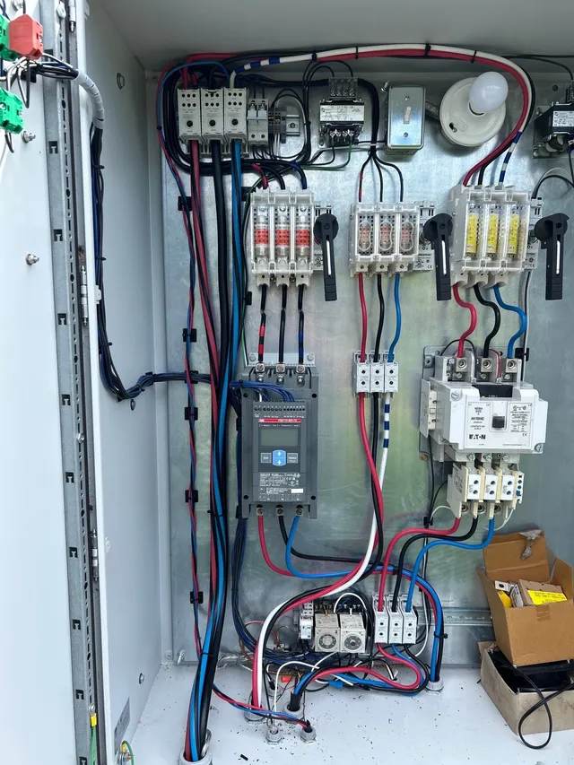 Wall-mounted drive and panel inside the pump house