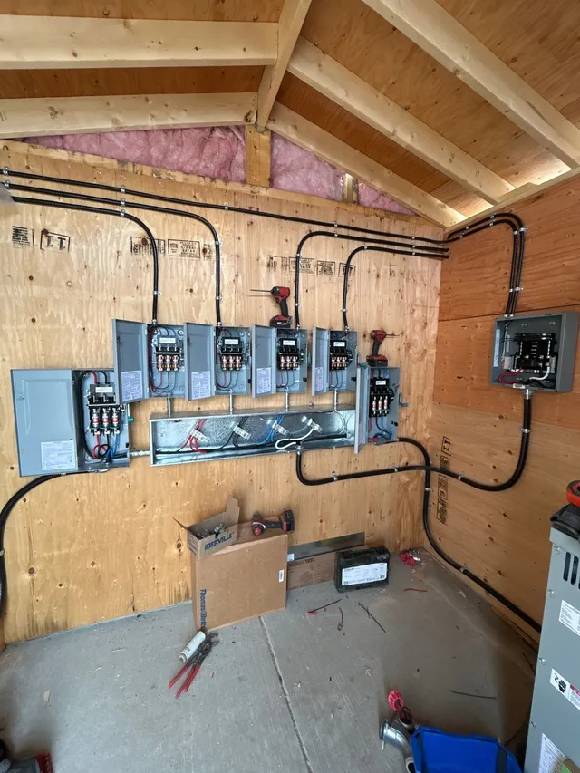Panel, drive and twin irrigation pumps in the pump shed corner