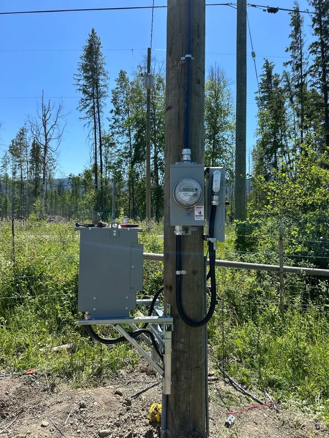 Panels, metering and disconnects roughed in on the pump shed wall