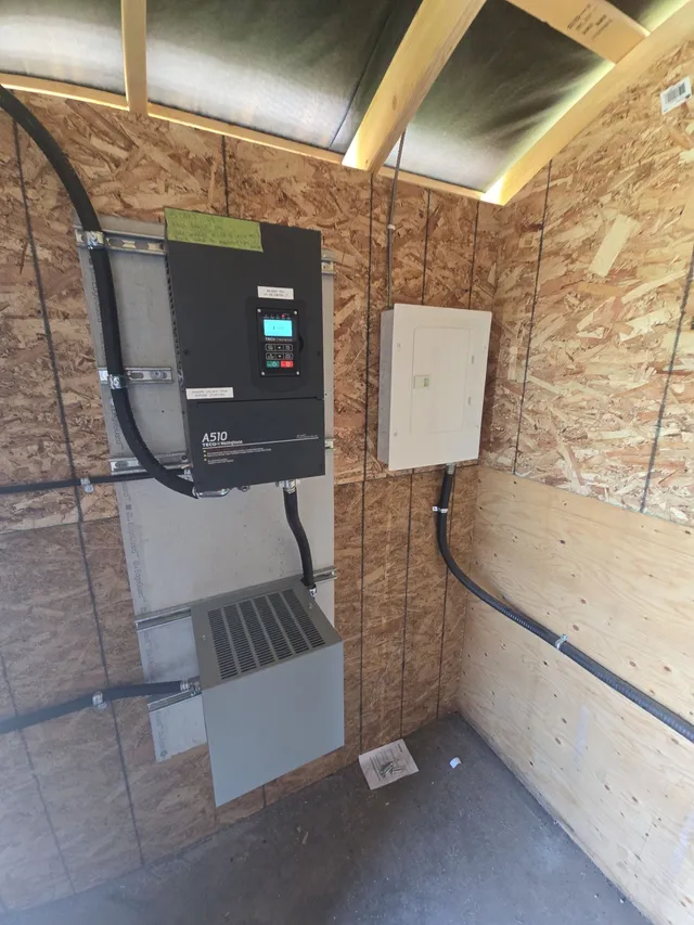 VFD with cooling vent and panelboard serving the irrigation pumps
