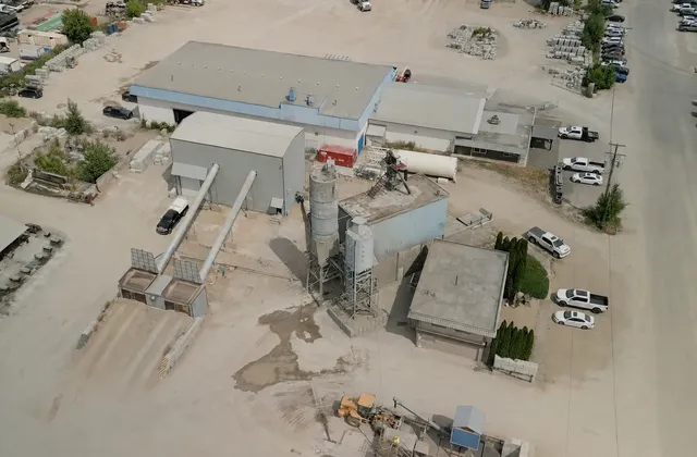 Overhead aerial of the Salmon Arm Ready Mix batch plant, silos and yard
